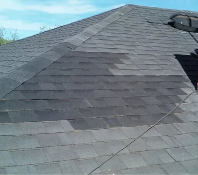 Roof section fully repaired with new shingles and plywood underlayer