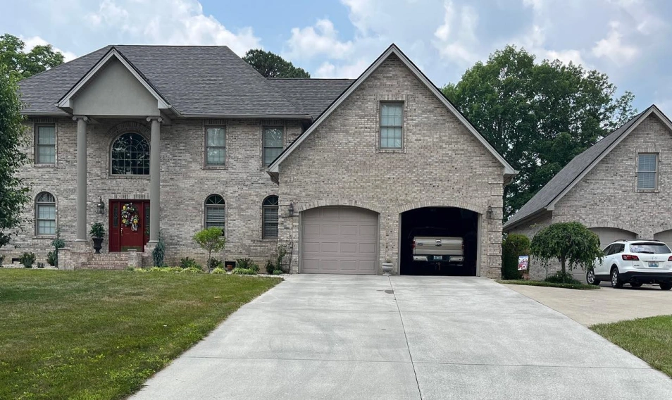 Steep-pitch residential roof completed by Spangler Roof Systems