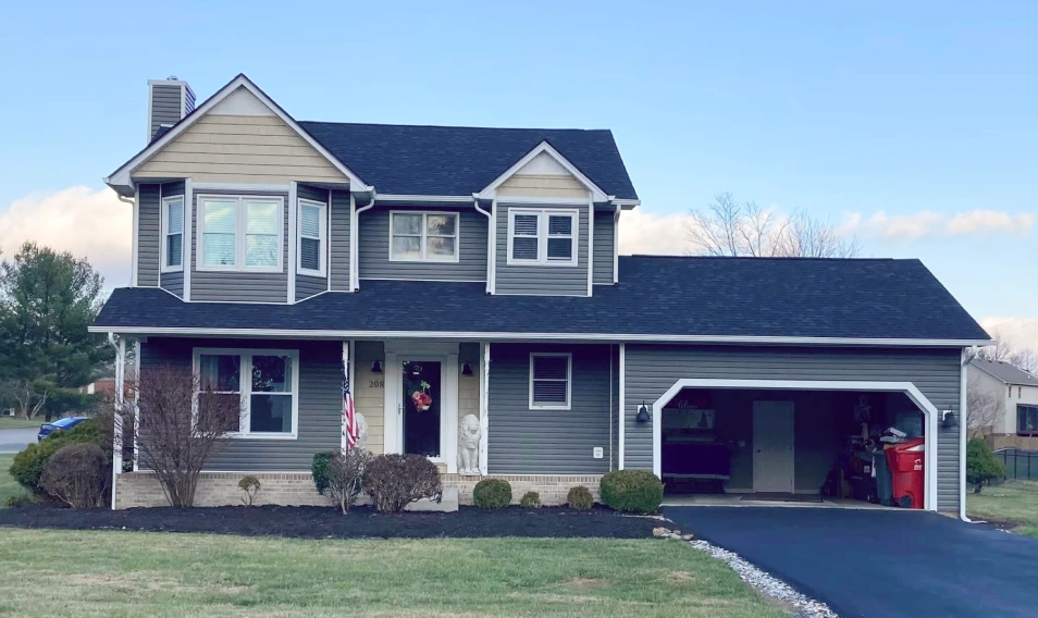 Roof replacement with new seamless gutters installed by Spangler Roof Systems