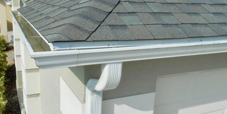 Seamless aluminum gutters installed along the eave of a Kentucky home